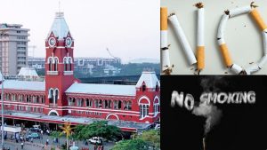 No smoking sign at Chennai Central Railway station with railway police in the background.