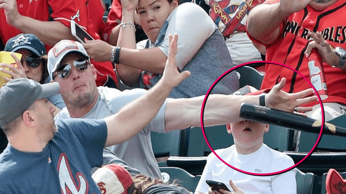 A father catching a falling child with incredible agility and focus.