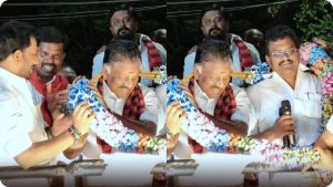 ஓபிஎஸ்-க்கு 15 கிலோ சாக்லேட் மாலை! "சாக்கடை பிரச்சனைக்கு உடனடி தீர்வு" - பிரச்சாரத்தில் அதிரடி உறுதி! DMK candidate O. Panneerselvam wearing a 15 kg chocolate garland during his 2026 election campaign in Bodinayakanur.