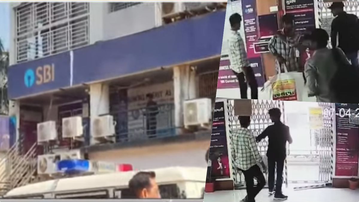 Armed robbers holding bank staff hostage inside an SBI branch in Surat.