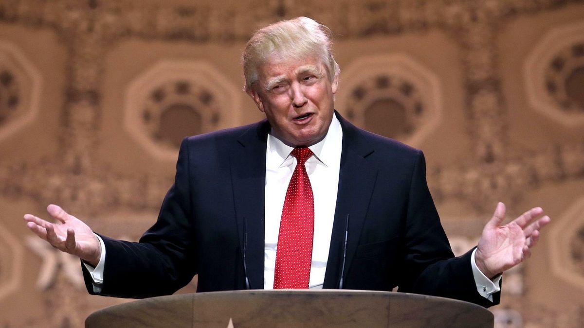 US President Donald Trump addressing the nation from the Oval Office, focusing on international diplomatic strategy.
