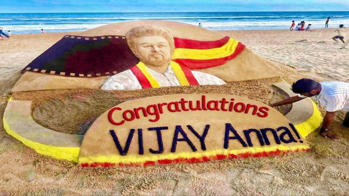 A giant sand sculpture of Tamil Nadu Chief Minister Vijay created by Sudarsan Pattnaik at Puri Beach.