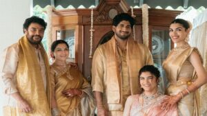 Chiranjeevi, Nagarjuna, Venkatesh, Amala Akkineni, and Trisha Krishnan wearing elegant traditional golden and ethnic attire while seated at Khushbu Sundar's daughter Avantika's wedding in Goa.