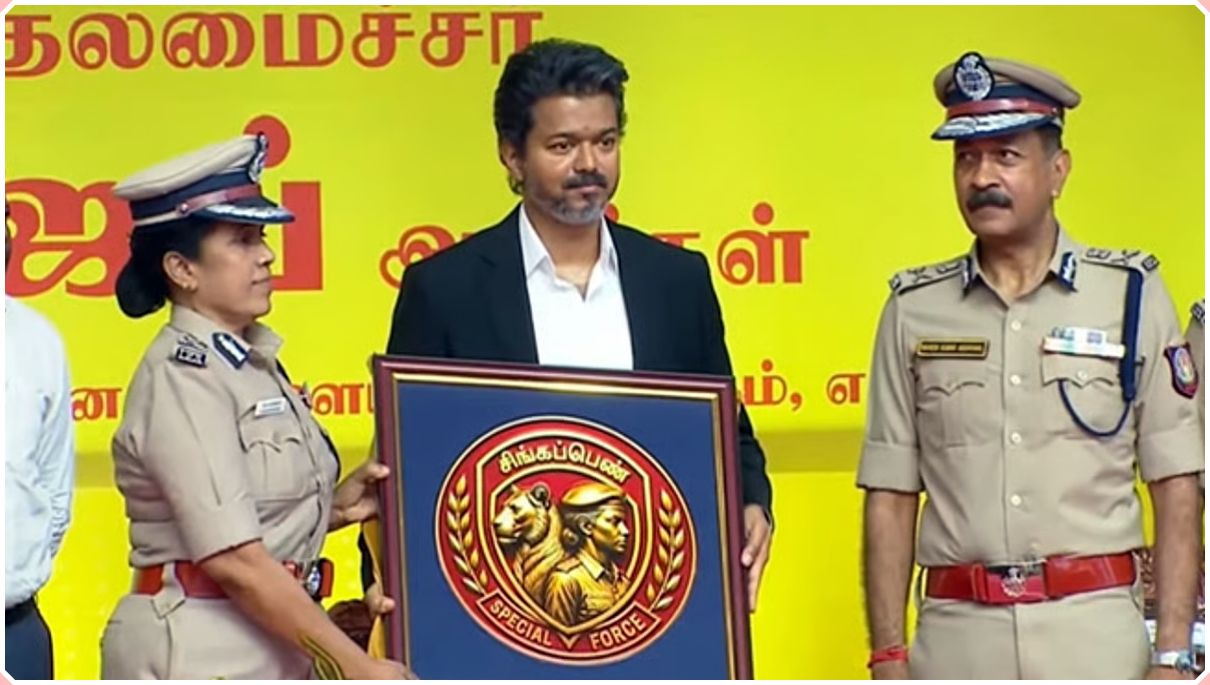 Chief Minister Vijay officially unveiling the large emblem board of the newly formed Singappen Special Task Force featuring a stylized lioness graphics background.