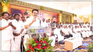 DMK President MK Stalin addressing a massive gathering at a formal stage event in Tiruvarur Kattur.