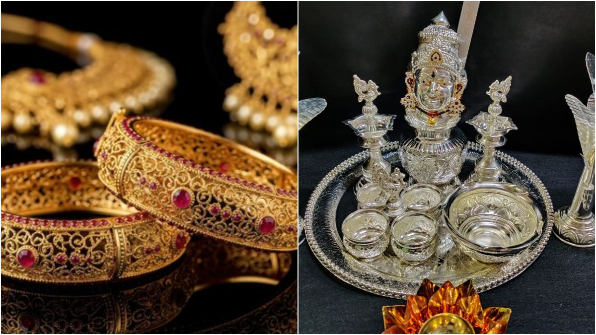 Elegant traditional South Indian 22kt gold bridal jewelry set placed next to shining silver bars on a premium royal blue silk fabric.