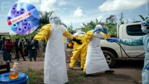 Healthcare workers in protective gear responding to the Ebola virus health emergency in Congo.