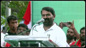 Naam Tamilar Katchi Chief Coordinator Seeman addressing a public gathering with expressive emotion.